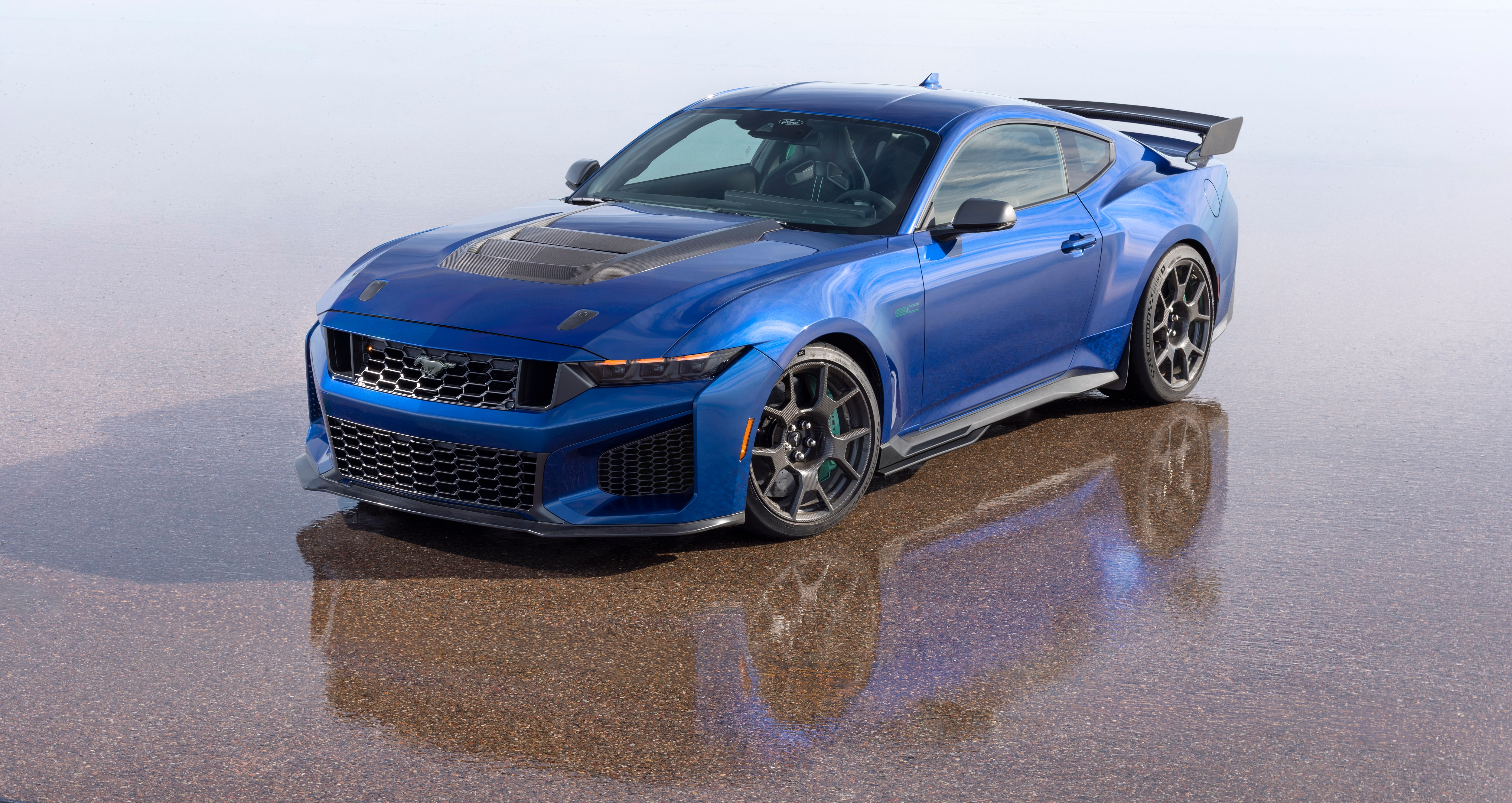 By working with the GTD team, we were able to adopt Brembo carbon-ceramic brakes and Michelin Pilot Sport Cup2 R tires for the Mustang Dark Horse SC Track Pack. Prototype vehicle shown. Actual production vehicle may vary. Available summer 2026.