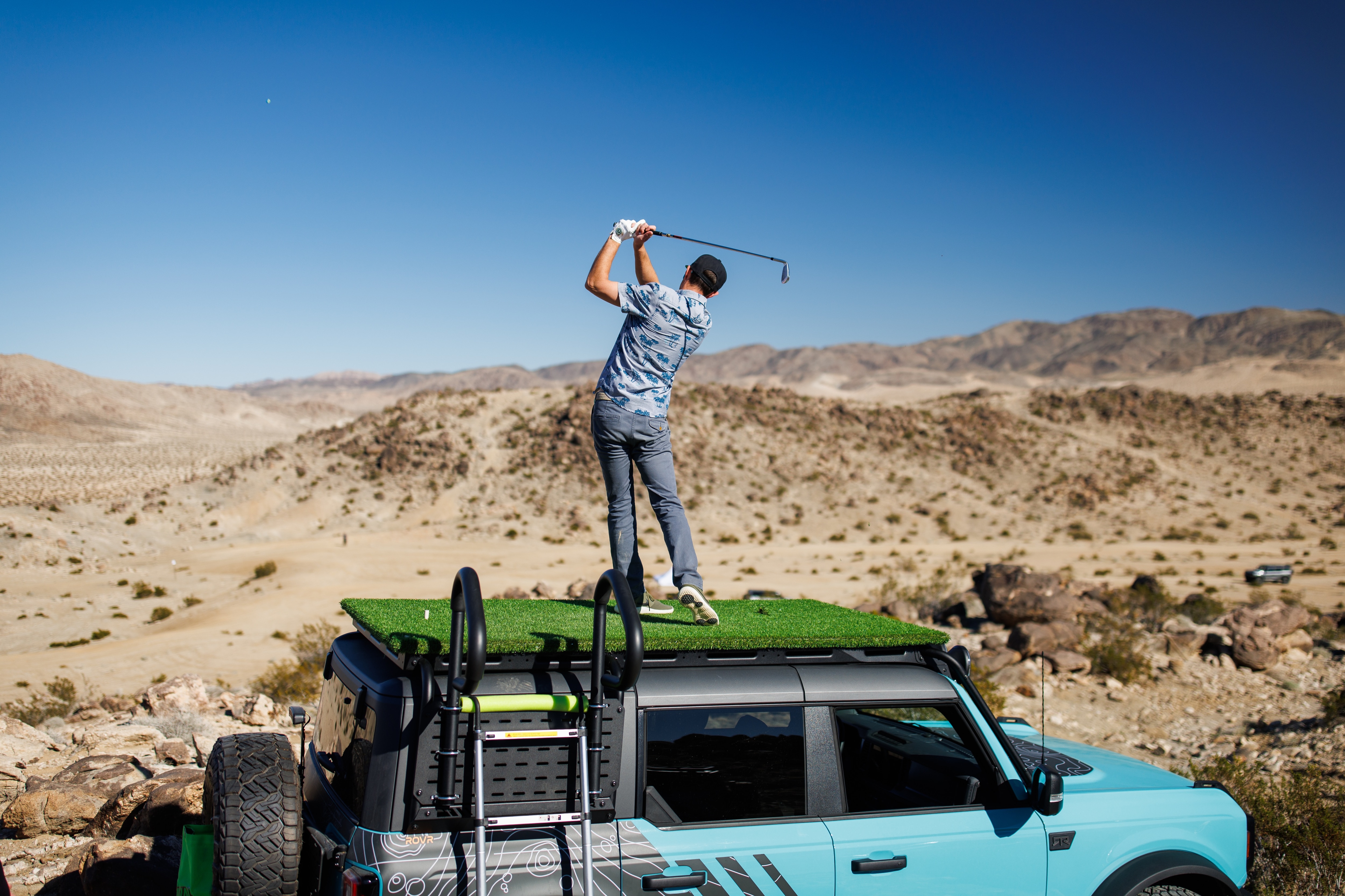 Vaughn Gittin Jr. and his RTR Vehicles team turned Johnson Valley into a golf course and Bronco® SUVS  into golf carts for an epic driving — and putting — extravaganza. 
