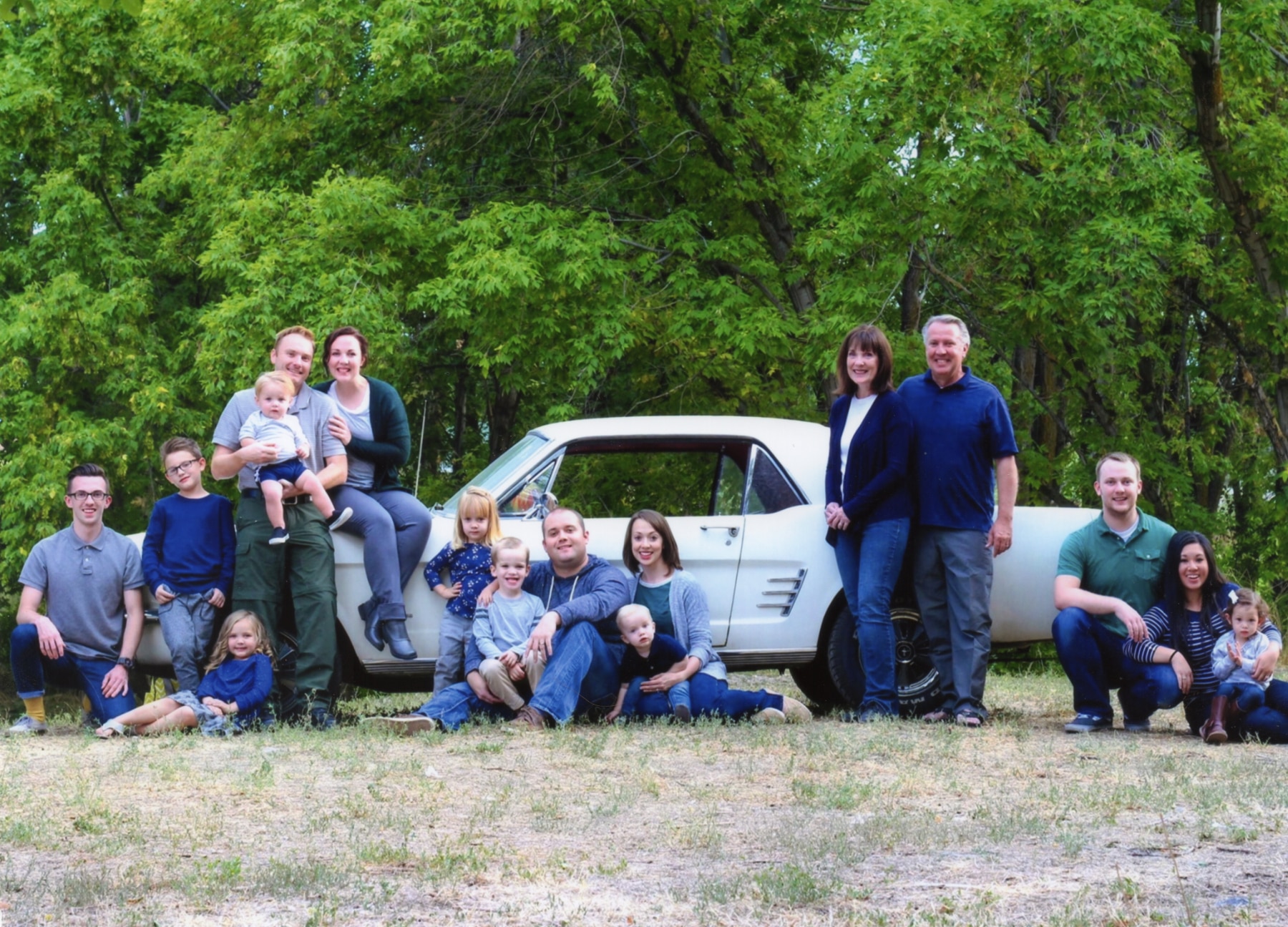 The family Mustang is at the center of each family photo from 1998 to 2025.
