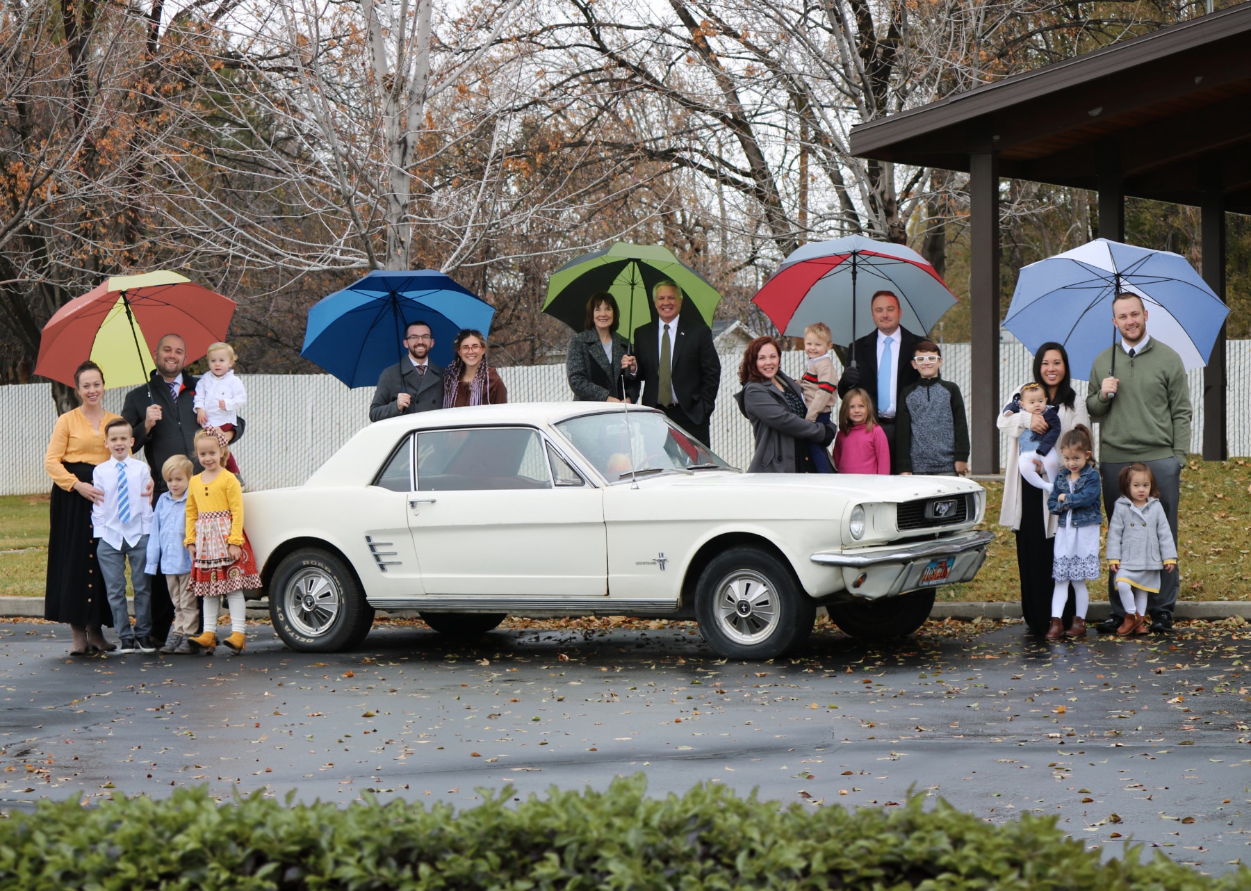 The family Mustang is at the center of each family photo from 1998 to 2025.