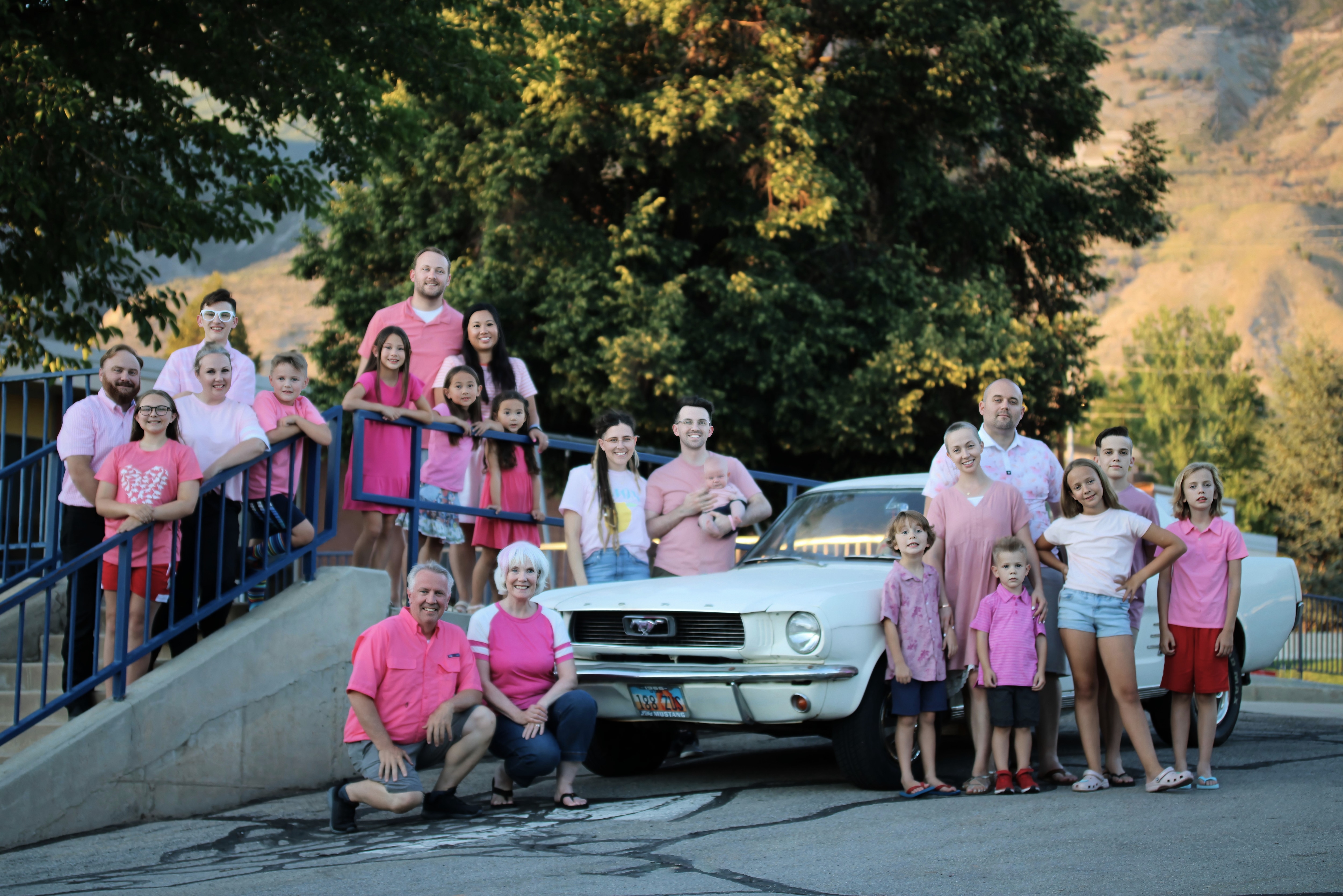 The family Mustang is at the center of each family photo from 1998 to 2025.