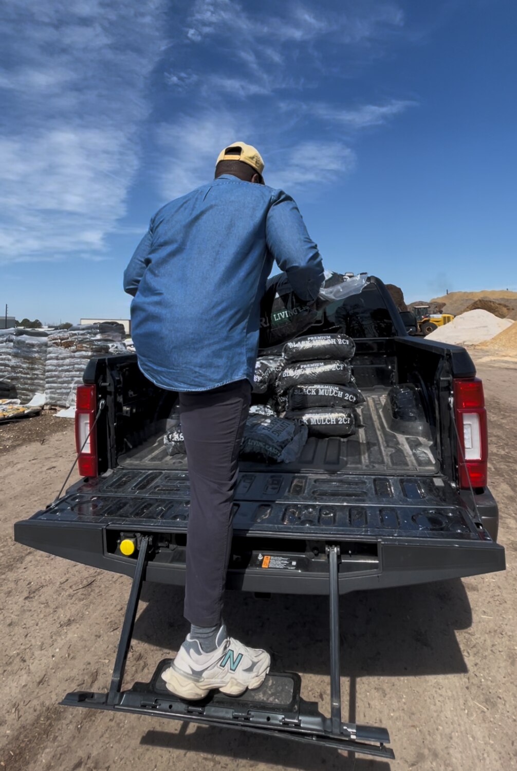Chaz Daughtry loading up his Ford Super Duty F-250 King Ranch's truck bed.