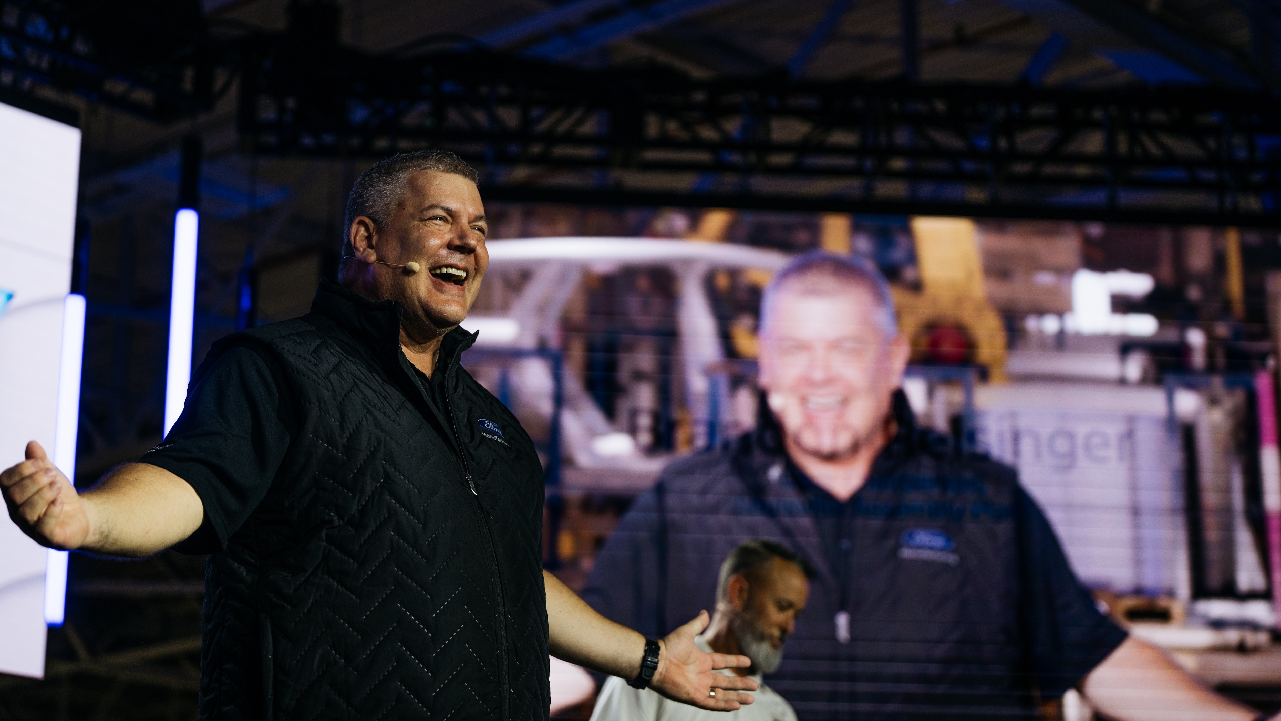 Bryce Currie, Ford vice president, Americas Manufacturing speaks during Monday’s launch event to introduce the new Ford Universal EV Platform and Ford Universal EV Production System at Louisville Assembly Plant on August 11, 2025. Louisville Assembly Plant will assemble the platform’s first vehicle – a midsize four-door electric pickup.