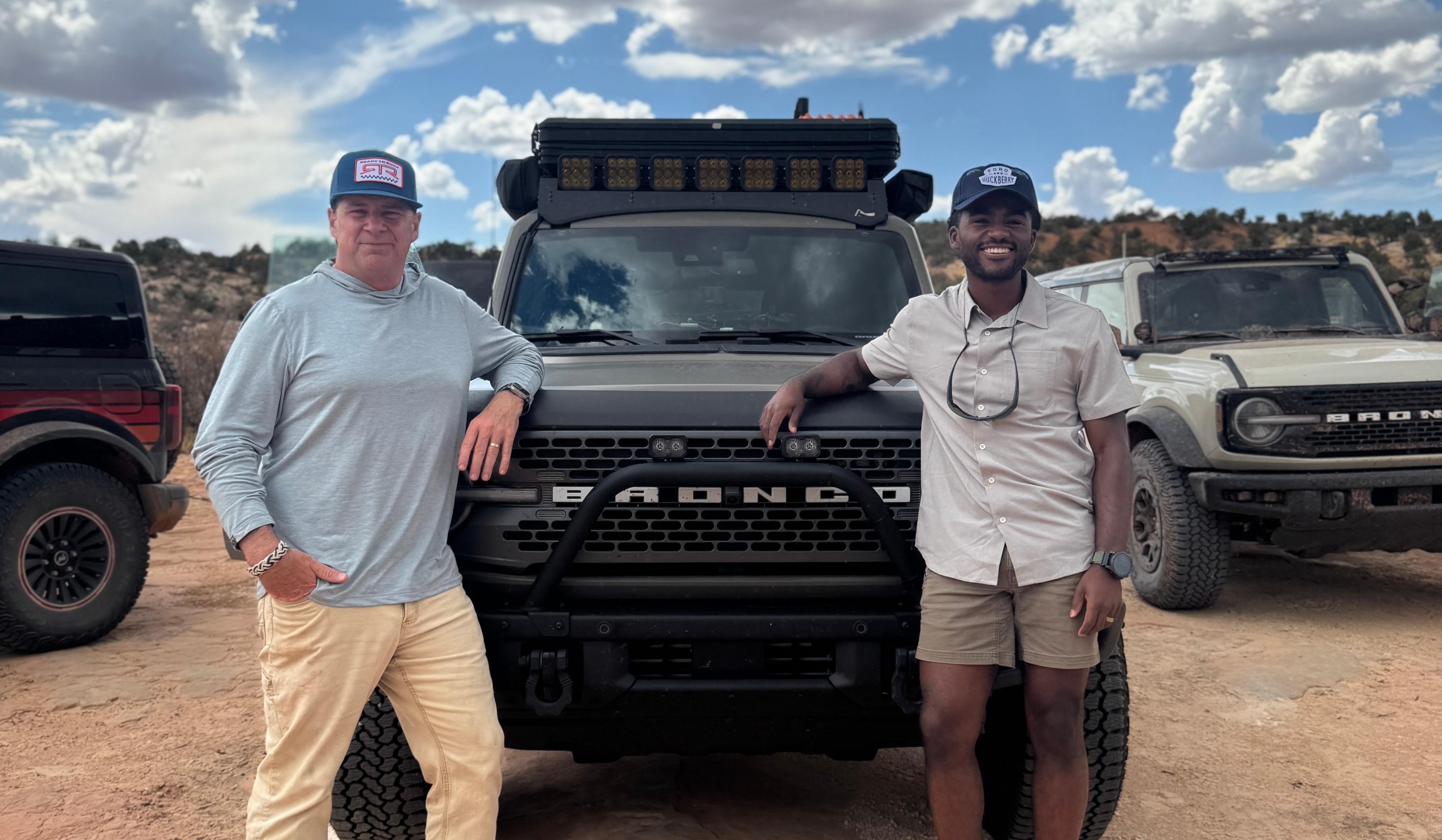 Jim and Caziah Franklin in front of Caziah’s Bronco.