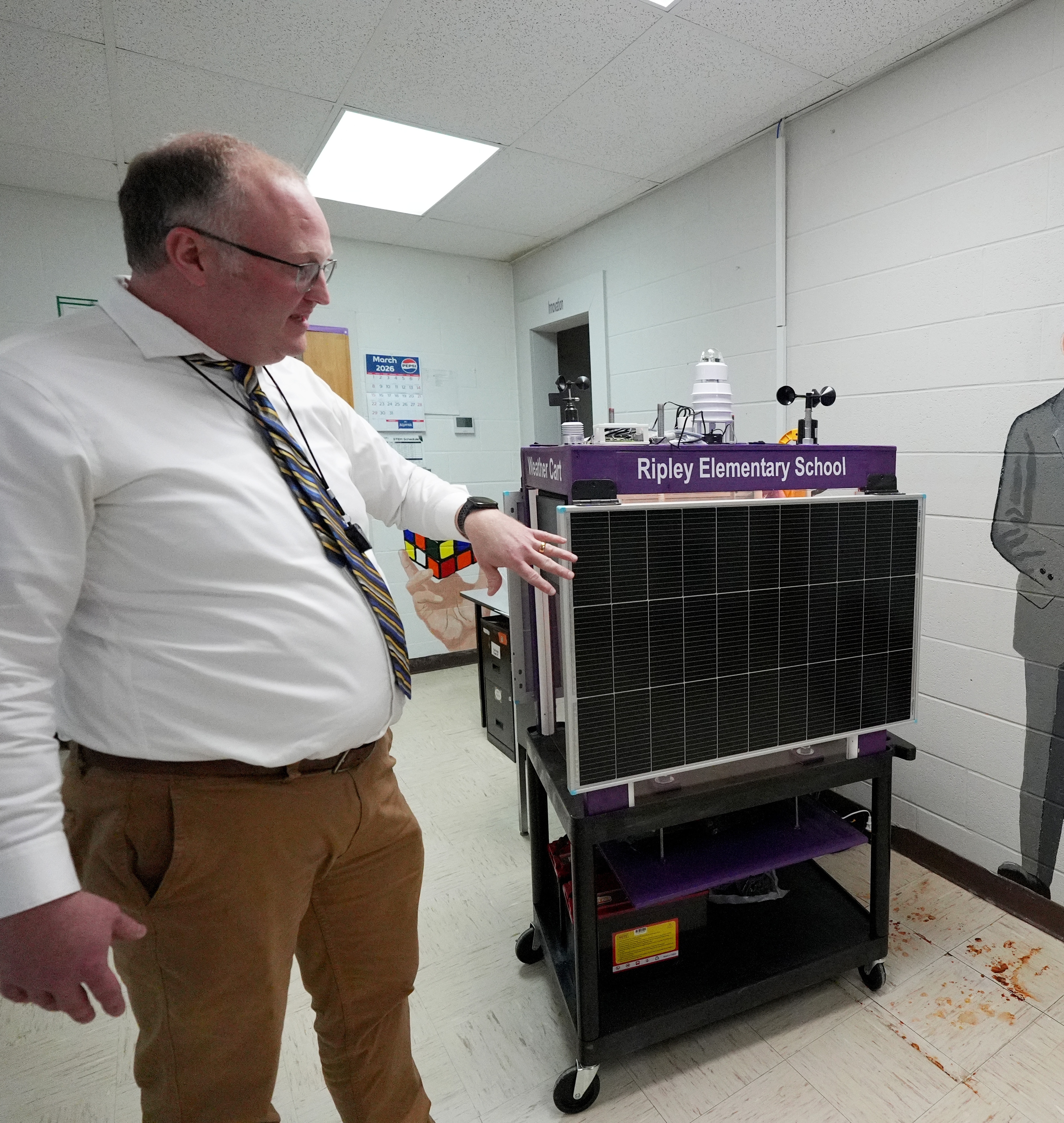 Jonathan Holmes points to a solar-powered weather reporting station built by students at Ripley Elementary School in Tennessee. The weather station is just one type of project made possible by the school’s Ford Future Builders Lab.