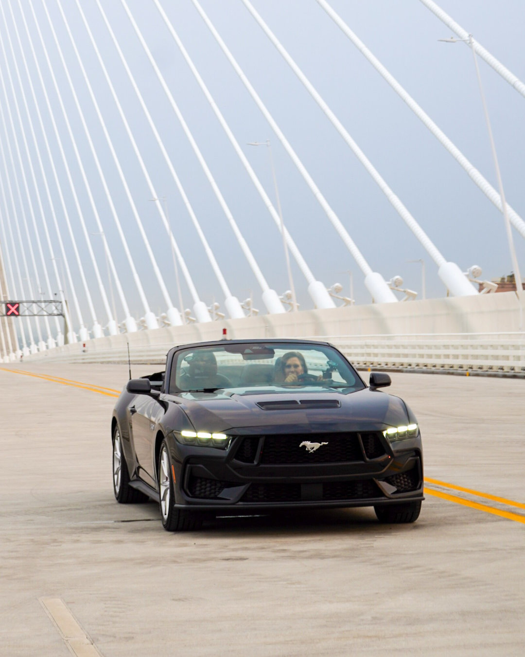 Michigan Gov. Gretchen Whitmer drive across the new Gordie Howe Bridge in a Ford Mustang on July 27., 2026.