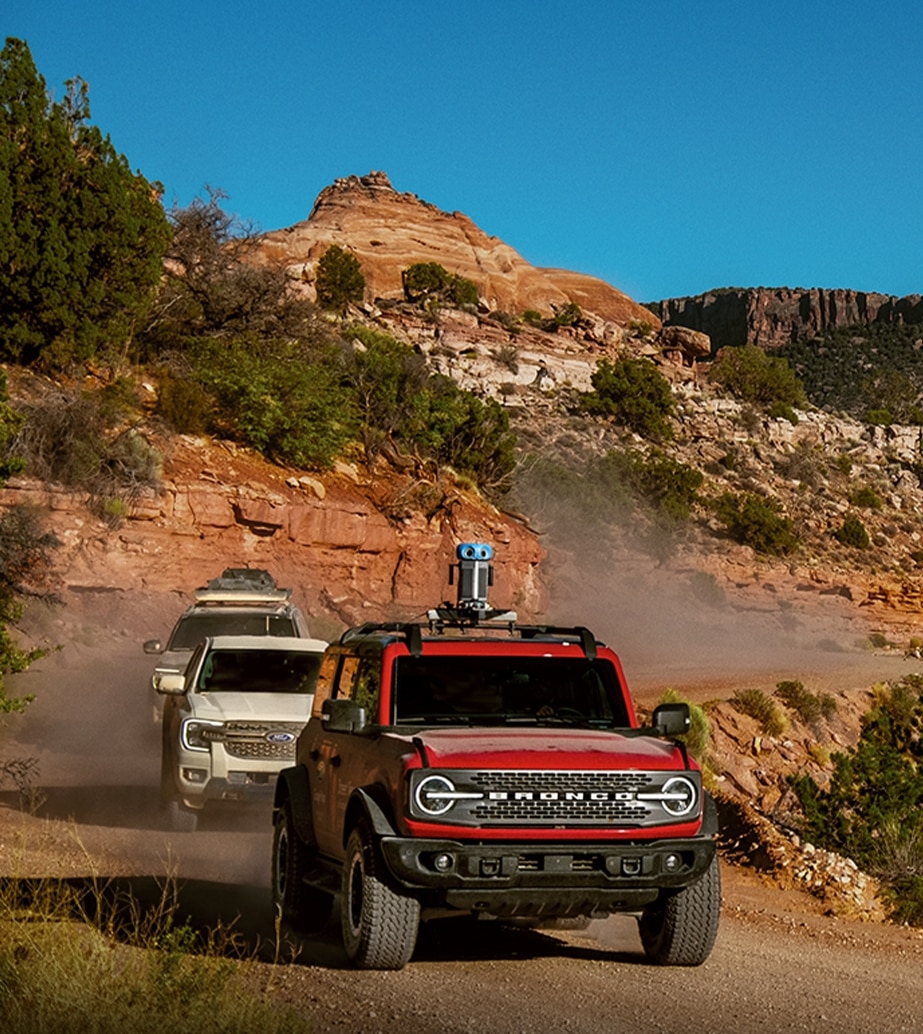 Professional driver on closed course. Always consult the Owner's Manual before off-road driving, know your terrain and trail difficulty, and use appropriate safety gear. Optional equipment and available Ford Accessories shown. Cargo load capacity limited by weight and weight distribution.